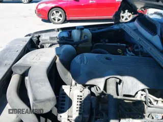 2004 Chevrolet Suburban LS z VIN 1GNFK16Z54J271918, wystawiony jako IAAI lot #38862513 z przebiegiem 251 676 mil mil oraz . Historia ofert i sprzedaży dostępna na DreamBid. Obrazek 12.