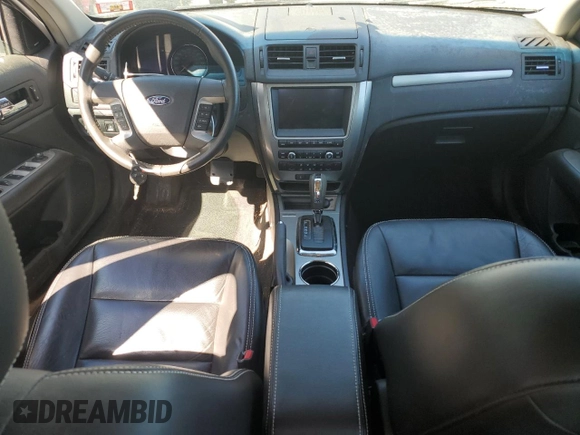 2010 Ford Fusion Hybrid z VIN 3FADP0L36AR211312, wystawiony jako Copart lot #55749425 z przebiegiem 39 223 mil mil oraz Szkoda całkowita • Salvage title. Historia ofert i sprzedaży dostępna na DreamBid. Obrazek 8.
