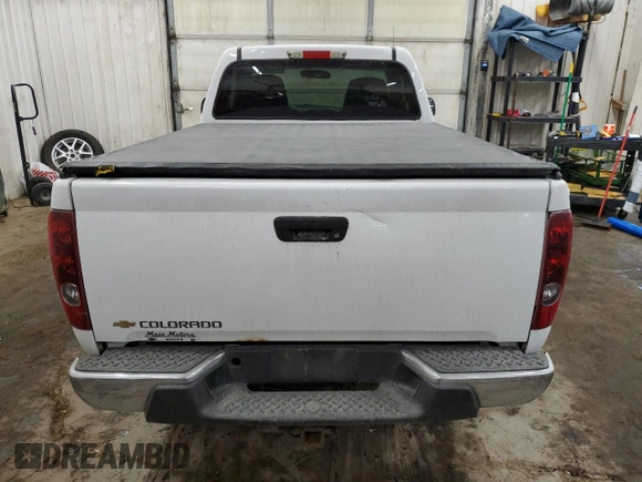2006 Chevrolet Colorado Work Truck z VIN 1GCCS148268238603, wystawiony jako Copart lot #41386645 z przebiegiem 150 781 mil mil oraz Szkoda całkowita • Salvage title. Historia ofert i sprzedaży dostępna na DreamBid. Obrazek 10.