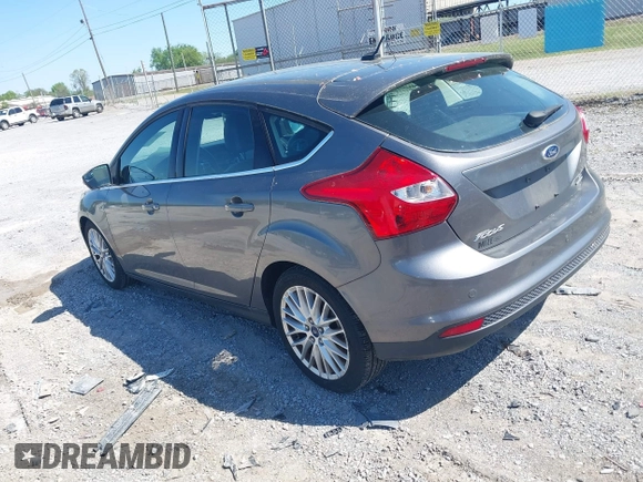 2012 Ford Focus SEL with VIN 1FAHP3M27CL399204, listed as a IAAI auction lot 41980976 with 113,443 mi miles. Bid and sale history available at carsss.com. Image 3.