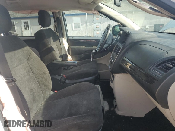 2014 Dodge Grand Caravan American Value with VIN 2C4RDGBG8ER245897, listed as a Copart auction lot 54066945 with 144,177 mi miles and Clean Title. Bid and sale history available at DreamBid. Image 7.