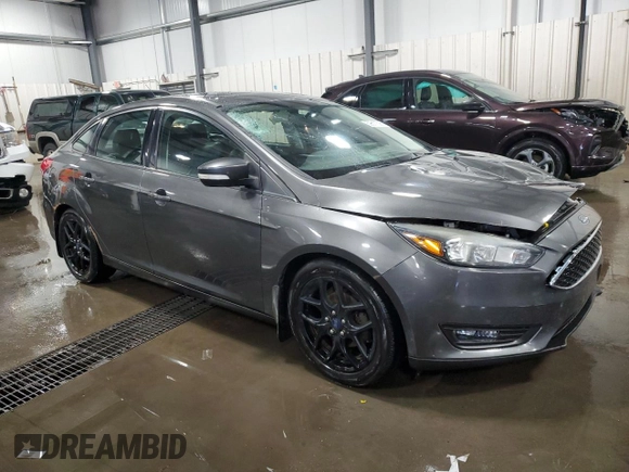 2016 Ford Focus SE z VIN 1FADP3F27GL216059, wystawiony jako Copart lot #59611395 z przebiegiem 170 468 mil mil oraz Szkoda całkowita • Salvage title. Historia ofert i sprzedaży dostępna na DreamBid. Obrazek 4.