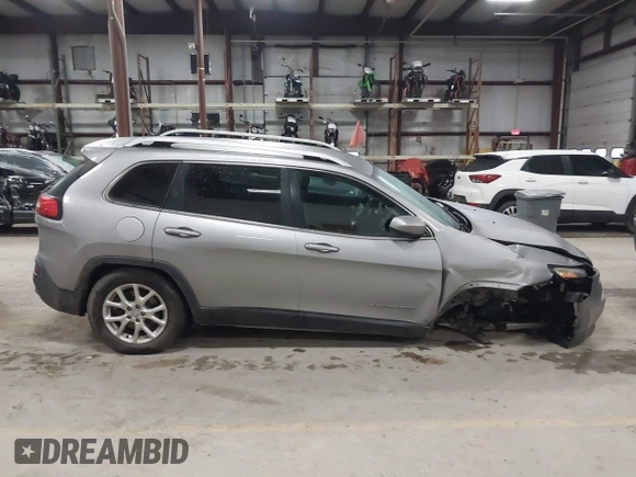 2016 Jeep Cherokee Altitude with VIN 1C4PJMCB6GW295404, listed as a IAAI auction lot 41211758 with 100,722 mi miles and . Bid and sale history available at DreamBid. Image 13.