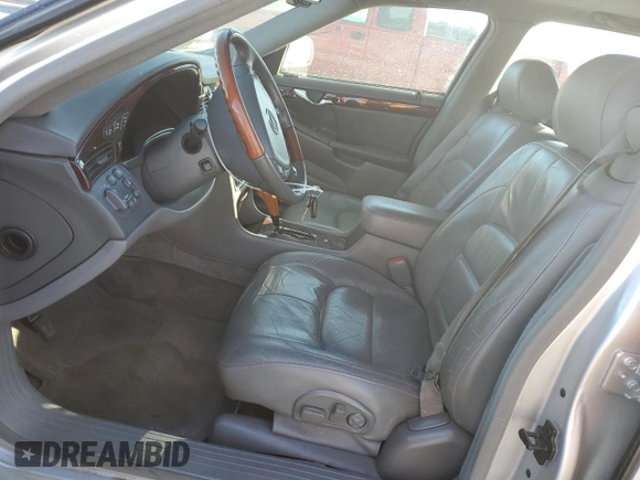2002 Cadillac DeVille DTS with VIN 1G6KF57922U124813, listed as a Copart auction lot 87055984 with 94,769 mi miles and Salvage Title. Bid and sale history available at carsss.com. Image 7.
