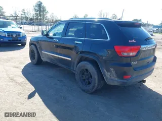 2011 Jeep Grand Cherokee Laredo with VIN 1J4RR4GG2BC585859, listed as a IAAI auction lot 41901919 with 272,585 mi miles. Bid and sale history available at carsss.com. Image 3.