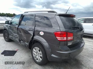 2018 Dodge Journey SE with VIN 3C4PDCAB4JT296083, listed as a IAAI auction lot 41976090 with 63,051 mi miles and . Bid and sale history available at DreamBid. Image 3.