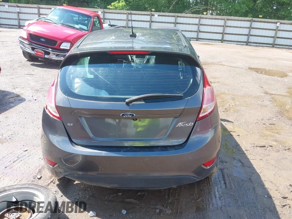 2019 Ford Fiesta SE z VIN 3FADP4EJ9KM125252, wystawiony jako IAAI lot #42221622 z przebiegiem 57 366 mil mil oraz . Historia ofert i sprzedaży dostępna na DreamBid. Obrazek 17.