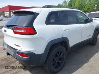 2016 Jeep Cherokee Trailhawk z VIN 1C4PJMBS7GW109189, wystawiony jako IAAI lot #42219470 z przebiegiem 115 197 mil mil oraz . Historia ofert i sprzedaży dostępna na DreamBid. Obrazek 4.