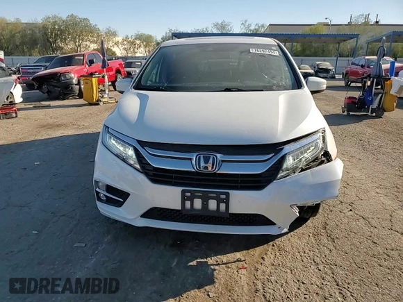 2020 Honda Odyssey Touring with VIN 5FNRL6H8XLB007622, listed as a Copart auction lot 76297494 with 83,452 mi miles and Salvage Title. Bid and sale history available at DreamBid. Image 12.