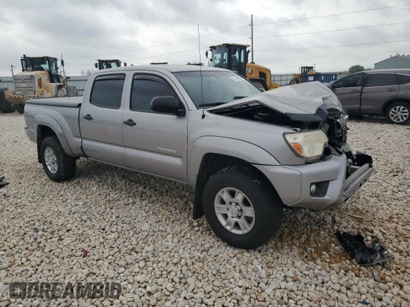 2014 Toyota Tacoma with VIN 3TMMU4FN0EM072840, listed as a Copart auction lot 51740805 with 128,678 mi miles and Salvage title. Bid and sale history available at DreamBid. Image 4.
