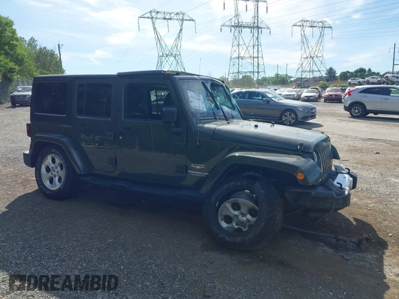 2015 Jeep Wrangler Unlimited Altitude z VIN 1C4HJWEG0FL752152, wystawiony jako IAAI lot #42311043 z przebiegiem 112 379 mil mil oraz . Historia ofert i sprzedaży dostępna na DreamBid. Obrazek 17.