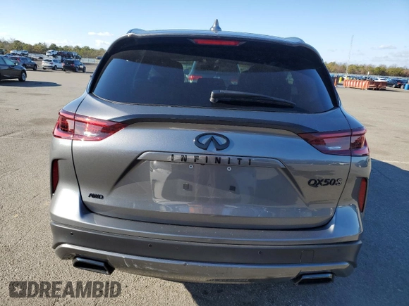 2023 Infiniti QX50 Sport with VIN 3PCAJ5FB6PF113227, listed as a Copart auction lot 84563144 with 7,465 mi miles and Salvage Title. Bid and sale history available at DreamBid. Image 6.