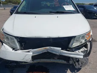 2012 Honda Odyssey EX-L with VIN 5FNRL5H61CB019215, listed as a IAAI auction lot 41837320 with 248,498 mi miles and . Bid and sale history available at DreamBid. Image 6.