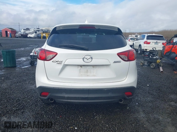 2015 Mazda CX-5 Grand Touring with VIN JM3KE4DY0F0483037, listed as a IAAI auction lot 41578222 with 102,988 mi miles. Bid and sale history available at carsss.com. Image 16.