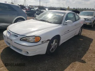 1999 Pontiac Grand Am GT with VIN 1G2NW12E0XM853038, listed as a Copart auction lot 69262194 with 162,986 mi miles and Salvage Title. Bid and sale history available at carsss.com. Image 1.