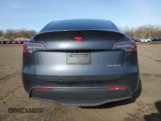 2025 Tesla Model Y Long Range with VIN 7SAYGDEE4SF291068, listed as a Copart auction lot 51204615 with 2,958 mi miles and Salvage Title. Bid and sale history available at DreamBid. Image 6.