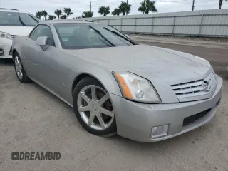 2008 Cadillac XLR z VIN 1G6YV36A285600199, wystawiony jako Copart lot #76229514 z przebiegiem Nie podano mil oraz Szkody całkowita. Historia ofert i sprzedaży dostępna na DreamBid. Obrazek 4.