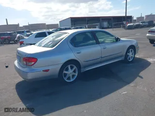 2002 Infiniti I35 Luxury with VIN JNKDA31A72T008698, listed as a IAAI auction lot 41287490 with 136,049 mi miles. Bid and sale history available at carsss.com. Image 4.