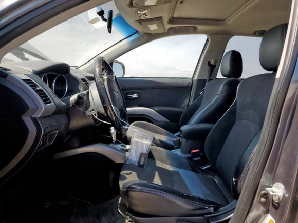2011 Mitsubishi Outlander SE with VIN JA4AS3AW4BU036458, listed as a Copart auction lot 56501535 with 218,646 mi miles and Salvage title. Bid and sale history available at DreamBid. Image 7.