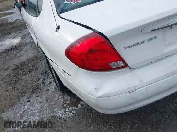 2002 Ford Taurus SES Standard with VIN 1FAFP55U12A184513, listed as a IAAI auction lot 41125306 with 241,896 mi miles. Bid and sale history available at carsss.com. Image 18.