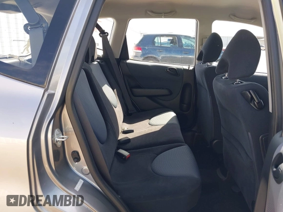 2007 Honda Fit with VIN JHMGD38437S003645, listed as a IAAI auction lot 42409925 with 166,481 mi miles and . Bid and sale history available at DreamBid. Image 8.