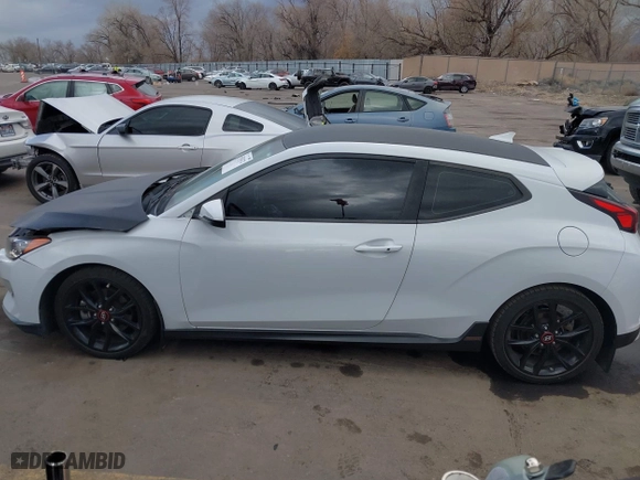 2019 Hyundai Veloster Turbo with VIN KMHTH6AB3KU020193, listed as a IAAI auction lot 41526722 with 54,697 mi miles. Bid and sale history available at carsss.com. Image 14.