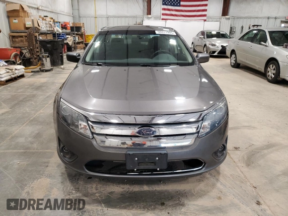 2010 Ford Fusion SE with VIN 3FAHP0HA5AR128799, listed as a Copart auction lot 59311905 with 107,903 mi miles and Non repairable. Bid and sale history available at DreamBid. Image 5.