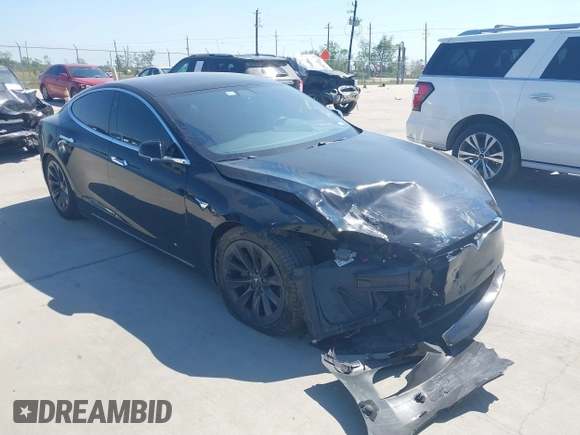 2020 Tesla Model S Long Range with VIN 5YJSA1E27LF397346, listed as a IAAI auction lot 40579015 with 43,779 mi miles and . Bid and sale history available at DreamBid. Image 1.