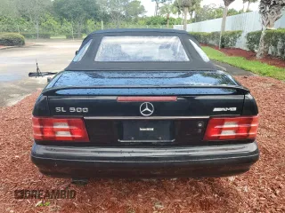 1997 Mercedes-Benz SL-Class with VIN WDBFA67F3VF147355, listed as a Copart auction lot 74295594 with 0 mi miles and Salvage Title. Bid and sale history available at carsss.com. Image 6.