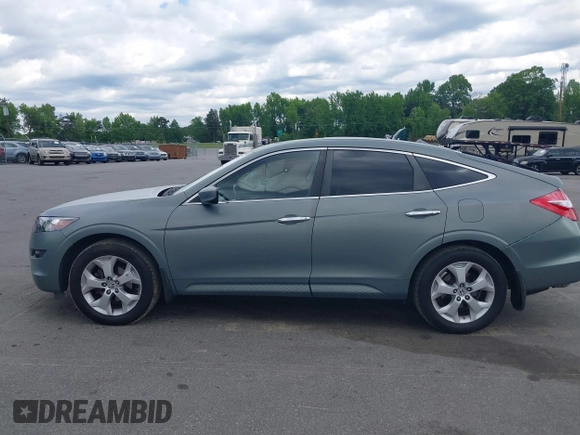 2010 Honda Crosstour EX-L z VIN 5J6TF1H5XAL013687, wystawiony jako IAAI lot #42187755 z przebiegiem 195 579 mil mil oraz . Historia ofert i sprzedaży dostępna na DreamBid. Obrazek 14.