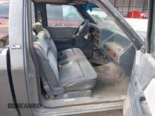 1992 Dodge Dakota z VIN 1B7FL26X0NS508319, wystawiony jako IAAI lot #42468014 z przebiegiem 195 683 mil mil oraz . Historia ofert i sprzedaży dostępna na DreamBid. Obrazek 5.