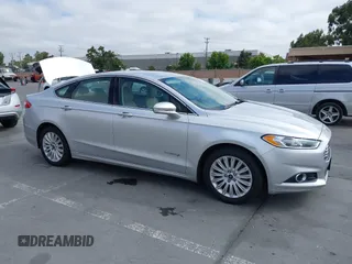 2013 Ford Fusion SE Hybrid с VIN 3FA6P0LU0DR345173, выставлен на аукционе IAAI как лот 42773217 с пробегом 127 166 миль миль и . История ставок и продаж доступна на DreamBid. Изображение 1.