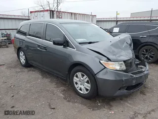 2013 Honda Odyssey LX with VIN 5FNRL5H24DB042230, listed as a IAAI auction lot 40954067 with 212,154 mi miles. Bid and sale history available at carsss.com. Image 1.