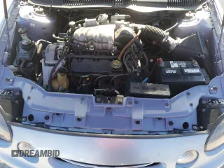 1998 Ford Taurus LX z VIN 1FAFP52U5WA273382, wystawiony jako Copart lot #77102854 z przebiegiem 73 014 mil mil oraz Szkoda całkowita • Salvage title. Historia ofert i sprzedaży dostępna na DreamBid. Obrazek 11.