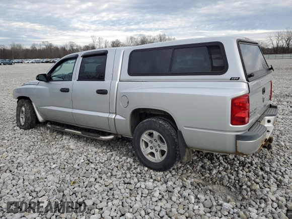 2007 Dodge Dakota SLT with VIN 1D7HW48P97S197684, listed as a Copart auction lot 86328944 with 122,969 mi miles and Salvage Title. Bid and sale history available at carsss.com. Image 2.