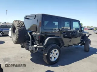 2013 Jeep Wrangler Unlimited Rubicon 10th Anniversary with VIN 1C4HJWFG4DL550832, listed as a Copart auction lot 71633684 with 60,759 mi miles and Salvage title. Bid and sale history available at DreamBid. Image 3.