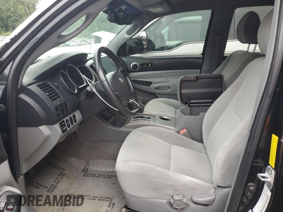 2010 Toyota Tacoma PreRunner with VIN 3TMJU4GN3AM097601, listed as a Copart auction lot 57703415 with 227,978 mi miles and Salvage title. Bid and sale history available at DreamBid. Image 7.