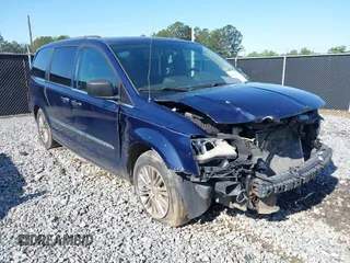 2013 Chrysler Town & Country Touring-L with VIN 2C4RC1CG7DR661162, listed as a IAAI auction lot 42026629 with 180,064 mi miles. Bid and sale history available at carsss.com. Image 1.