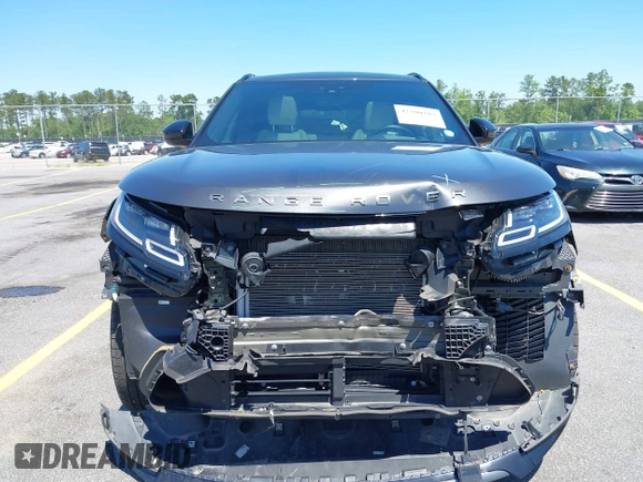 2020 Land Rover Range Rover Velar R-Dynamic S z VIN SALYK2EX5LA243809, wystawiony jako IAAI lot #42200383 z przebiegiem 66 381 mil mil oraz . Historia ofert i sprzedaży dostępna na DreamBid. Obrazek 13.