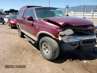1999 Ford F-150 XL z VIN 1FTRX18LXXNB23891, wystawiony jako Copart lot #61445645 z przebiegiem 179 410 mil mil oraz Szkoda całkowita • Salvage title. Historia ofert i sprzedaży dostępna na DreamBid. Obrazek 13.