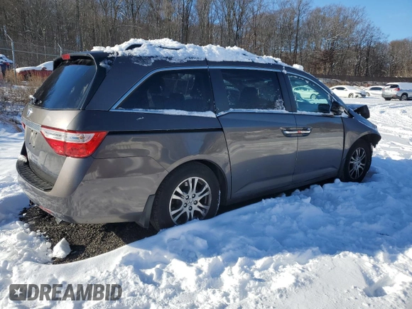 2012 Honda Odyssey EX-L with VIN 5FNRL5H66CB023339, listed as a Copart auction lot 86205974 with 136,087 mi miles and Salvage Title. Bid and sale history available at carsss.com. Image 3.