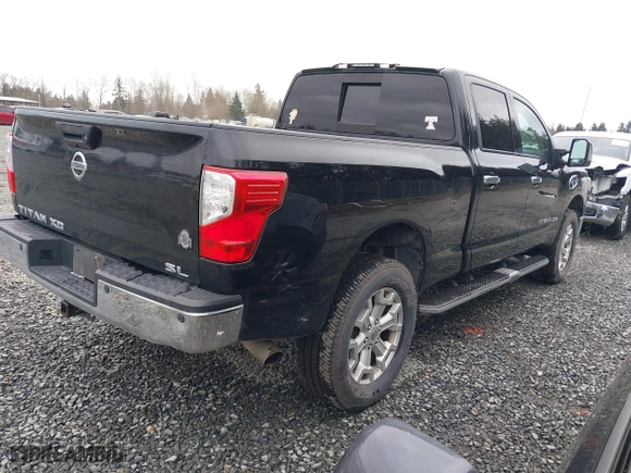 2016 Nissan Titan XD Platinum Reserve with VIN 1N6BA1F2XGN502660, listed as a IAAI auction lot 41731577 with 118,581 mi miles. Bid and sale history available at carsss.com. Image 4.