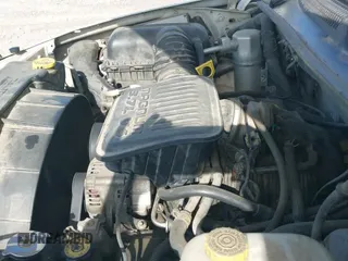 2004 Dodge Dakota Sport with VIN 1D7HL38KX4S721444, listed as a IAAI auction lot 42248222 with 248,582 mi miles and . Bid and sale history available at DreamBid. Image 12.