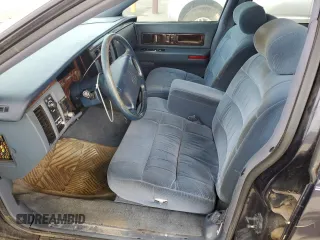 1996 Cadillac Fleetwood z VIN 1G6DW52P2TR710009, wystawiony jako Copart lot #67530934 z przebiegiem 127 910 mil mil oraz Tytuł czysty. Historia ofert i sprzedaży dostępna na DreamBid. Obrazek 7.