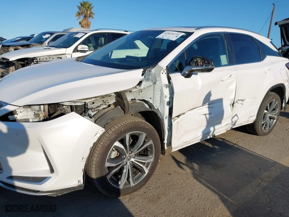 2022 Lexus RX with VIN 2T2HGMDA8NC074588, listed as a IAAI auction lot 41828234 with 106,845 mi miles. Bid and sale history available at carsss.com. Image 6.