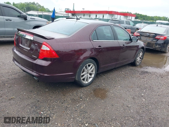 2012 Ford Fusion SEL z VIN 3FAHP0JG3CR443568, wystawiony jako IAAI lot #42335839 z przebiegiem 134 700 mil mil oraz . Historia ofert i sprzedaży dostępna na DreamBid. Obrazek 4.