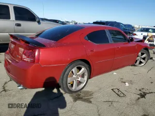 2006 Dodge Charger SRT-8 with VIN 2B3KA73W66H283699, listed as a Copart auction lot 44060975 with 126,105 mi miles and Salvage Title. Bid and sale history available at DreamBid. Image 3.