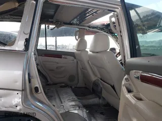 2008 Lexus GX 470 with VIN JTJBT20X580149408, listed as a IAAI auction lot 41589652 with 212,443 mi miles. Bid and sale history available at carsss.com. Image 8.