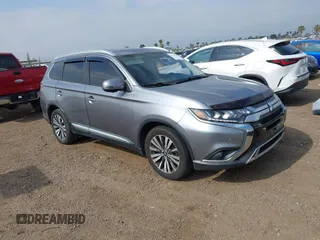 2019 Mitsubishi Outlander SE z VIN JA4AD3A32KZ006829, wystawiony jako IAAI lot #42153587 z przebiegiem 71 894 mil mil oraz . Historia ofert i sprzedaży dostępna na DreamBid. Obrazek 1.