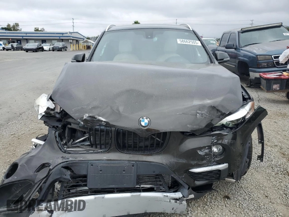 2018 BMW X1 xDrive28i с VIN WBXHT3C30J5K29979, выставлен на аукционе Copart как лот 58662505 с пробегом 61 461 миль миль и Списание • Salvage title. История ставок и продаж доступна на DreamBid. Изображение 5.